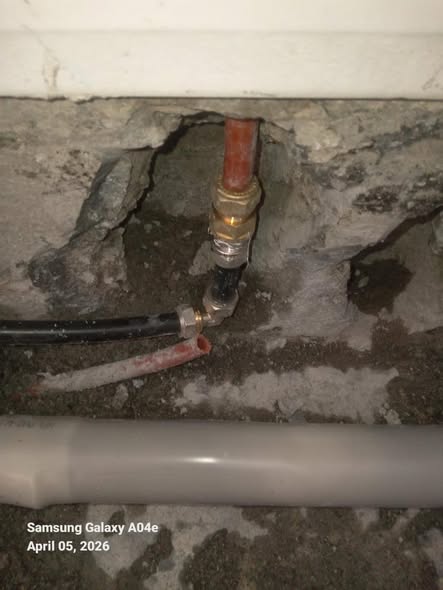 Damaged water pipe being repaired on site by BFC Ltd plumbers