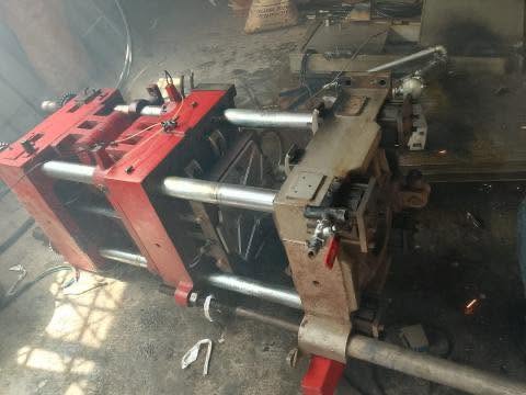Industrial equipment being dismantled for scrap metal collection in Mauritius