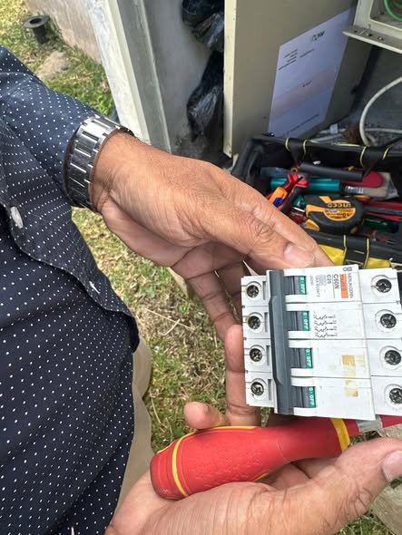 Faulty MCCB removed from an electrical panel during an inspection in Mauritius